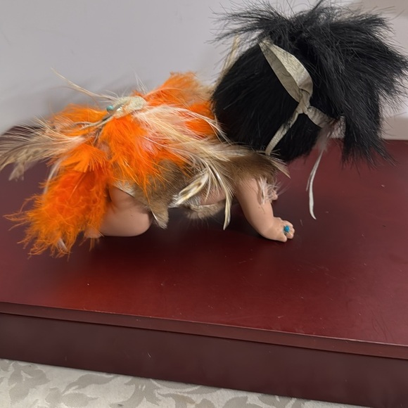 Highly Collectable Native American Crawling Baby Porcelain Doll with Feathers - Picture 4 of 8